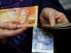 Rand strengthens against the dollar